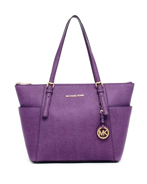 michael kors purple totes.